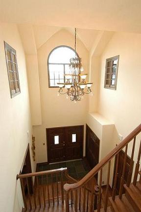 Look down the entrance hall from second floor