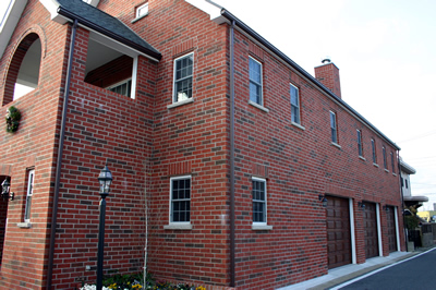 Brick cladding for adults with triple built in garage